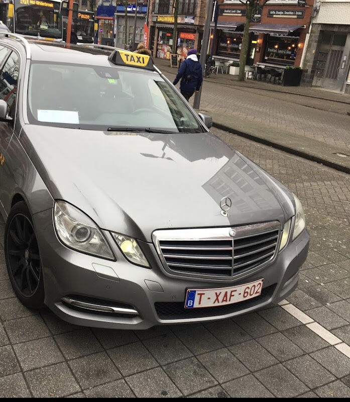 Foto van taxi mol geel lommel 24/7